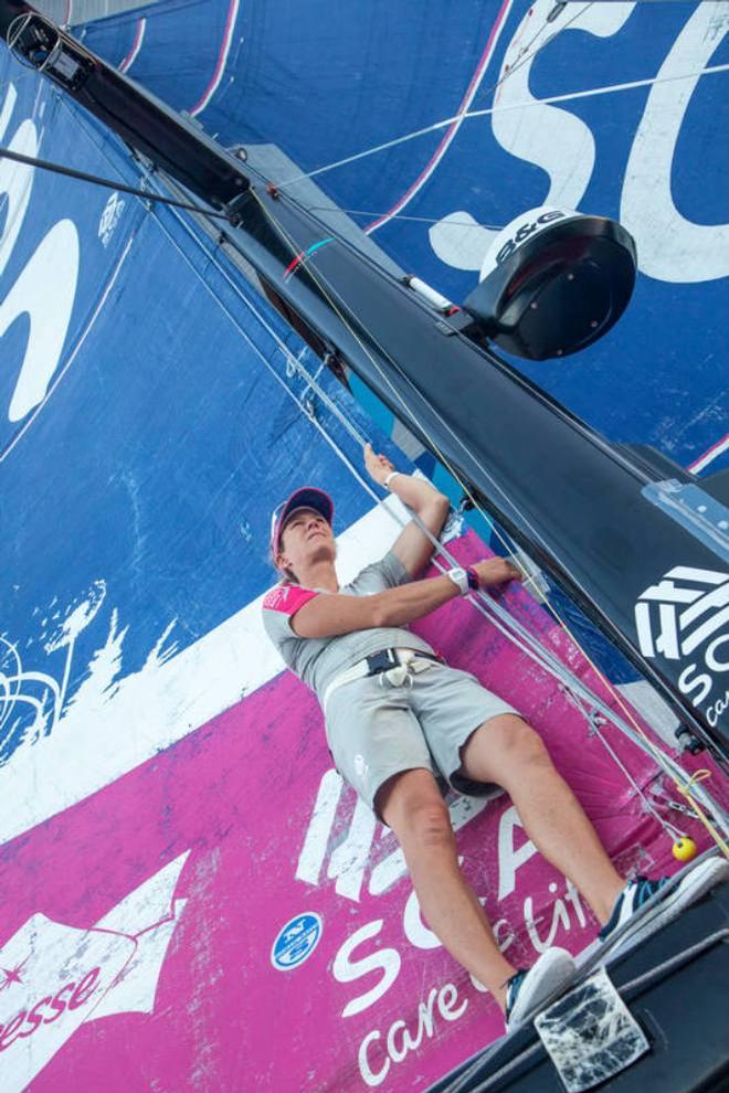Onboard Team SCA – Carolijn Brouwer climbs on top of the boom to look for wind - Leg six to Newport – Volvo Ocean Race 2015 © Corinna Halloran / Team SCA